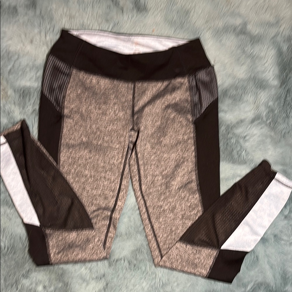 Tangerine Women’s Black and Gray Leggings with Blue‎ detail.
